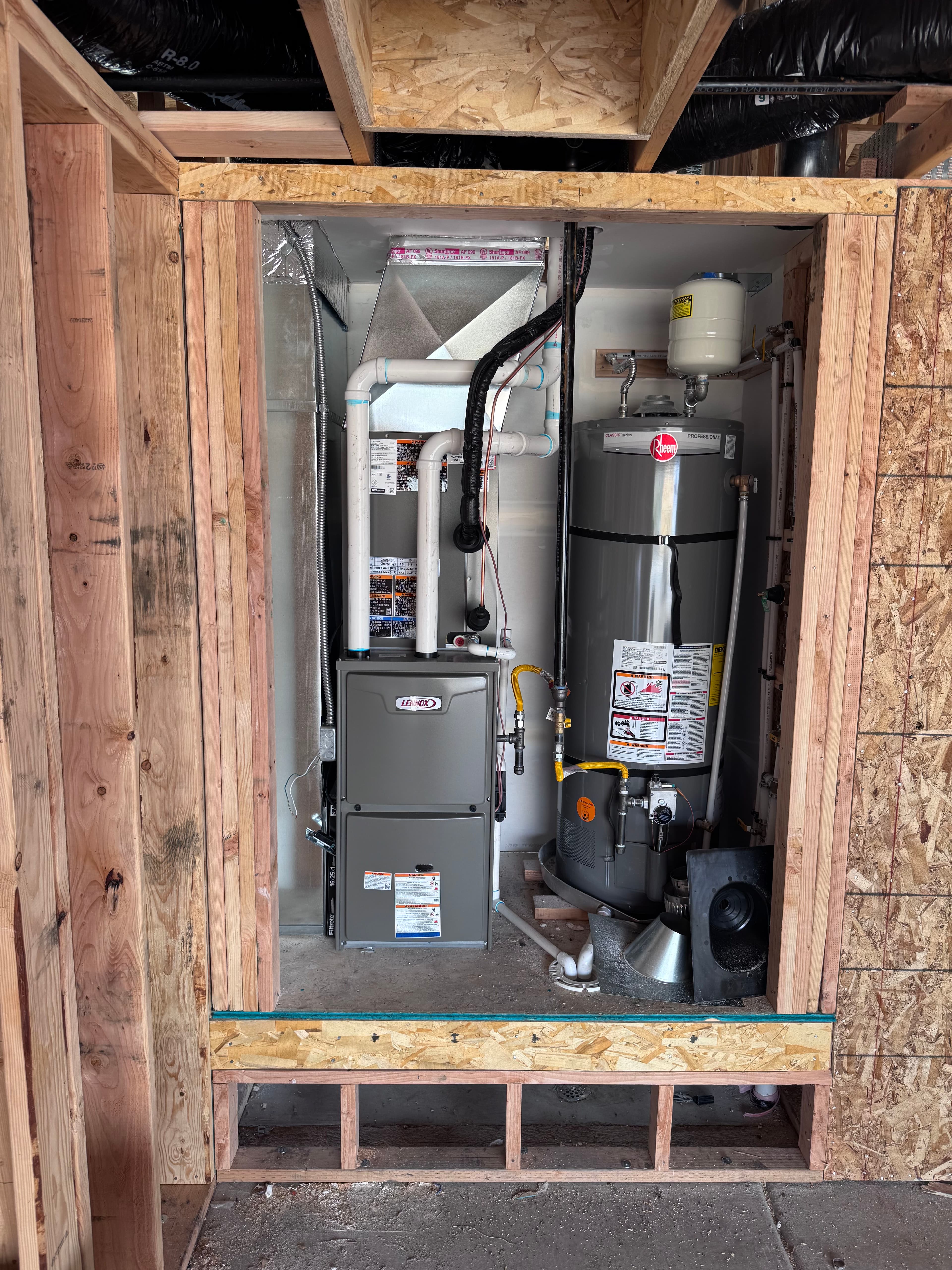 Project New Build Furnace and Water Heater Install in a Compact Mechanical Space image