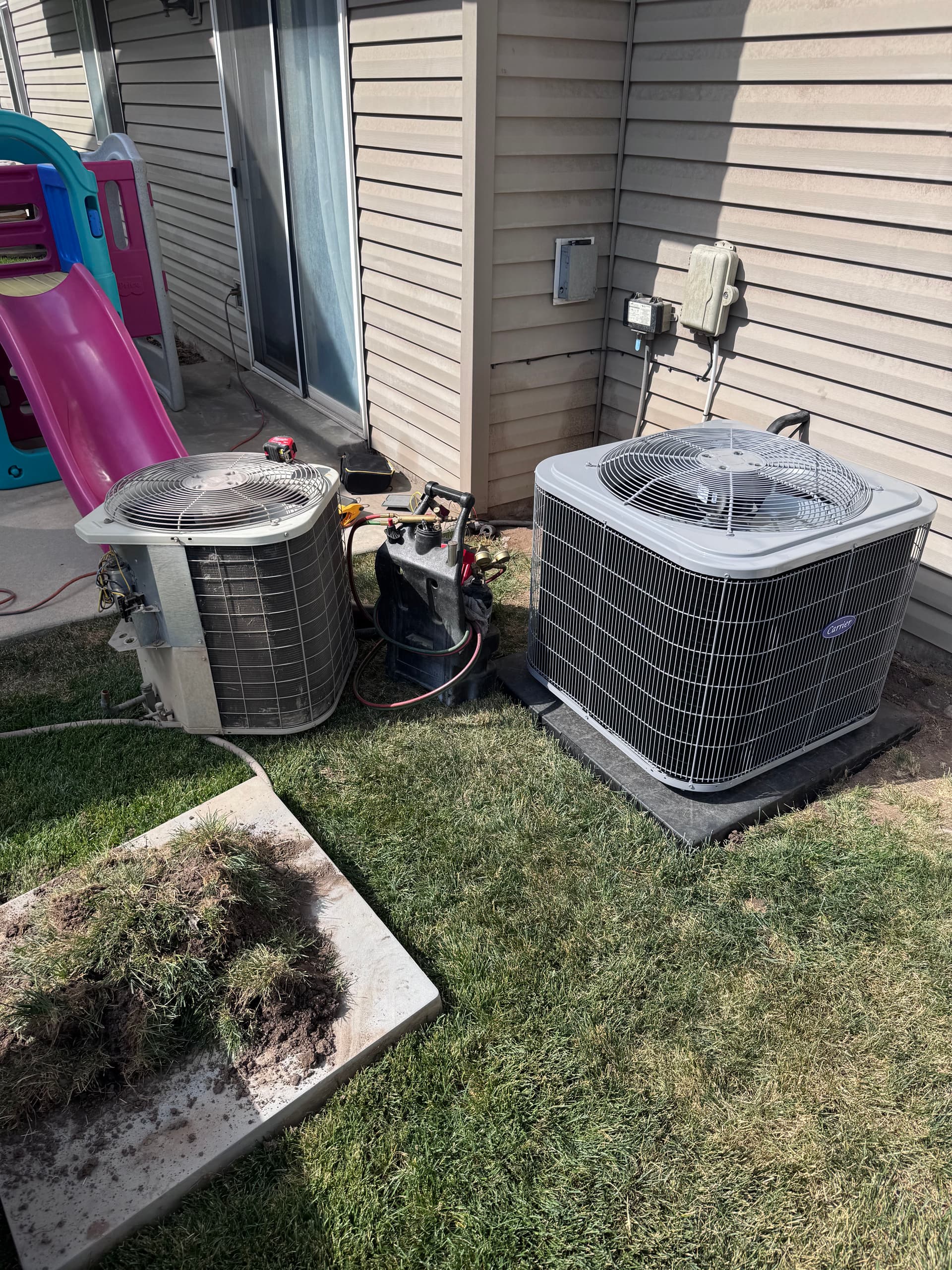 Old A/C Unit Out, New Carrier System In image